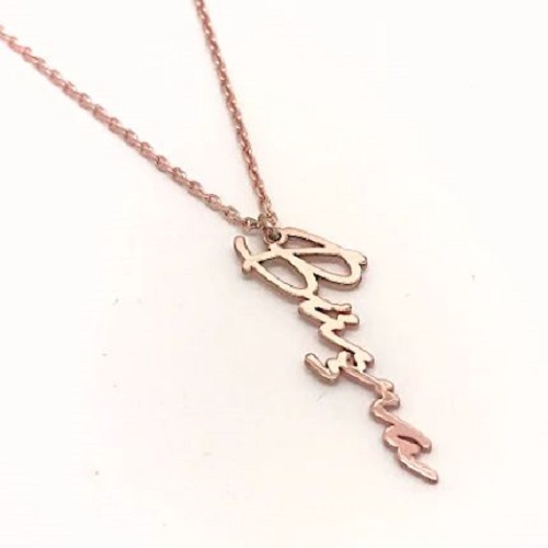 Wrap your little one in love! A Baby Name Necklace, beautifully engraved with their name, makes a heartfelt statement piece that grows with them, capturing memories forever.