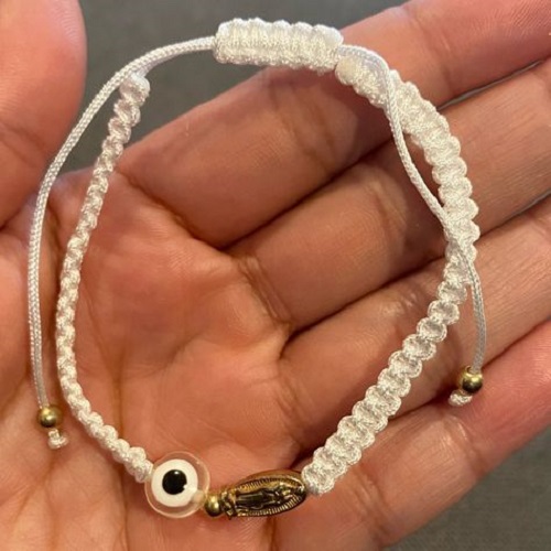 Infuse love and protection into every outfit - our Baby Evil Eye Bracelet is a charming talisman crafted for luck, safety, and an added dose of cuteness to your baby's ensemble.
