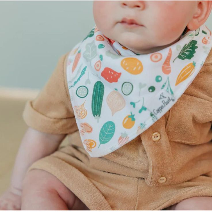 Learn the ideal age for babies to start using drool bibs